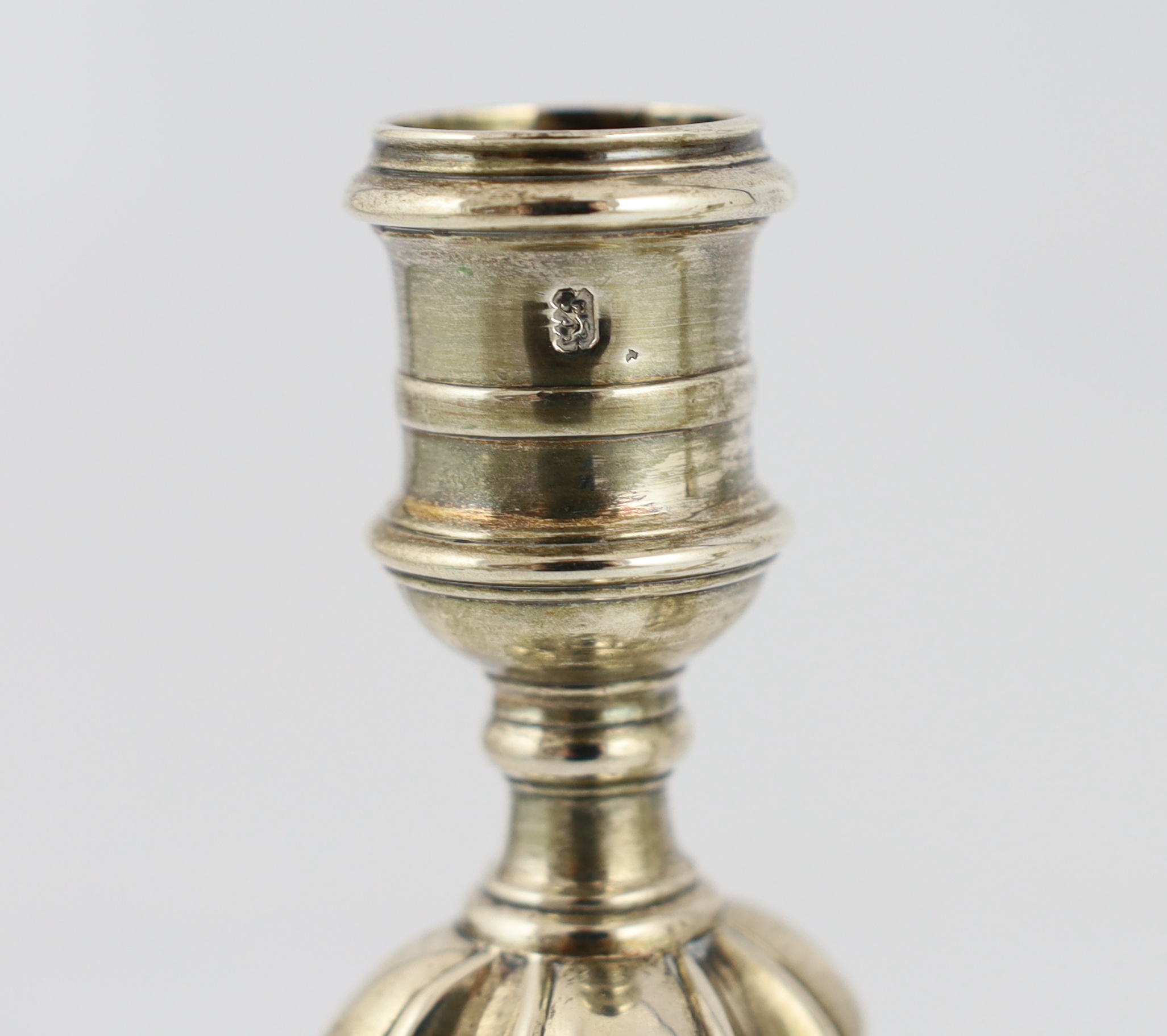 A pair of George II cast silver candlesticks, by Richard Gosling